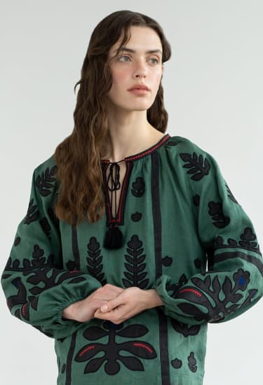 a_girl_in_a_green_dress